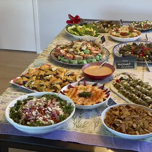 a table full of different types of food