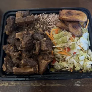 Jammin Ox Tails with rice &amp; beans, cabbage, and plantains