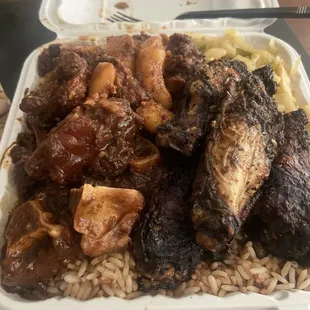 Oxtail, Jerk Wings, rice and peas, cabbage