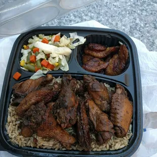 Jerk chicken, rice and peas, plantains. Yum
