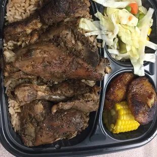Jerk chicken with rice and peas, cabbage, and plantains (and corn - it was supposed to be corn or plantains, so I got a bonus!)