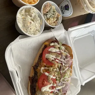 a sandwich in a styrofoam container