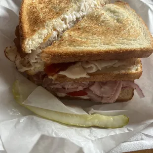 a sandwich on a piece of paper