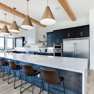 a kitchen with a large island