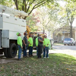 The Wichita Tree Service Guys looking for a good place to put the Rope.