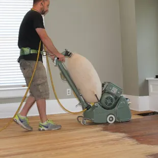 Sanding down an old fir floor in Riverside.