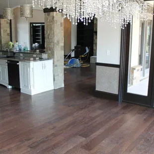 Professional Cleaning of an engineered floor.  We brought this new floor back to it's natural beauty!