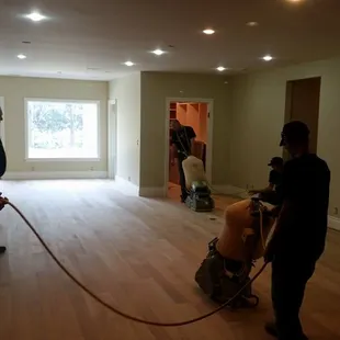 Sanding a White Oak 5" floor.