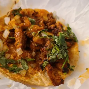 Pork Tacos with their hot sauce!! Delicious! And Affordable.