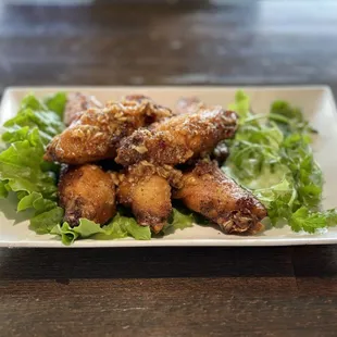 Our #1 most popular item on the Bar Food Menu, Fish Sauce Chicken Wings (Cánh Gà Chiên Nước Mắm)