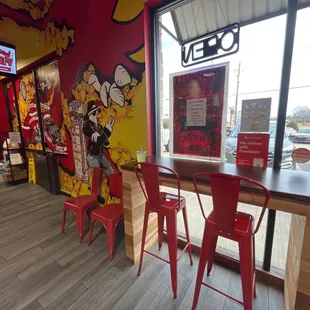 red chairs and a wooden table