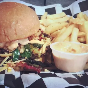 Handcrafted burger with grilled fresh red peppers, jalapeños, cheddar, wicked sauce!