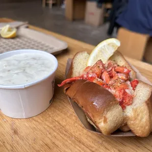 Hot lobster roll and cup of clam chowder