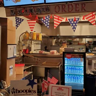 a restaurant counter and menus