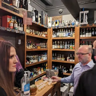 people in a liquor shop