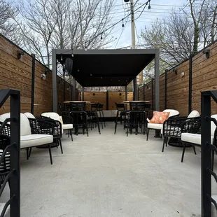 Outdoor seating on the back patio - newly renovated!