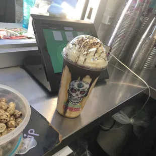 White chocolate mocha &amp; caramel frappe with whip cream and chocolate and caramel drizzle
