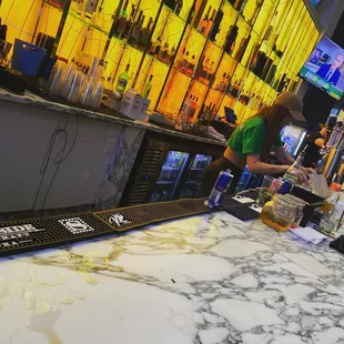 a bar with a marble bar top