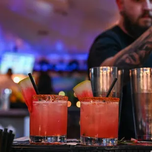 a bartender preparing cocktails