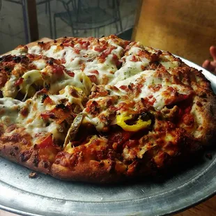 mighty meaty wick (3 added toppings to half)