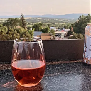 a glass of wine on a table
