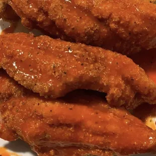 a plate of fried wings