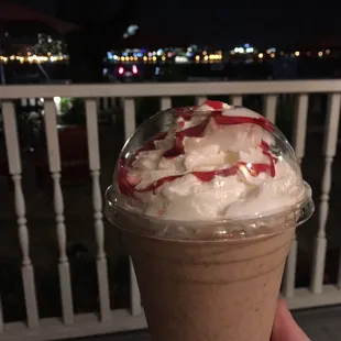 French Vanilla Heath Frozen Brew with raspberry drizzle.