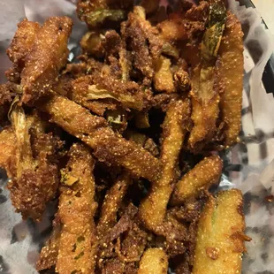 $12 for these burnt, greasy, inedible fried pickles (barely any pickles inside)