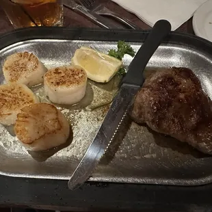 Steak and scallops.