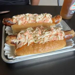 Jalapeno Cheddar dog topped with coleslaw.