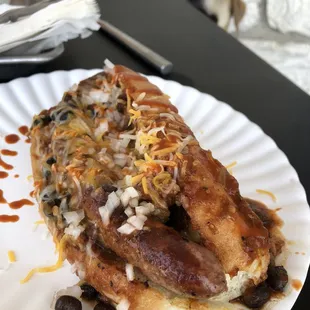 Chili cheese dog and jealous dog photobomb