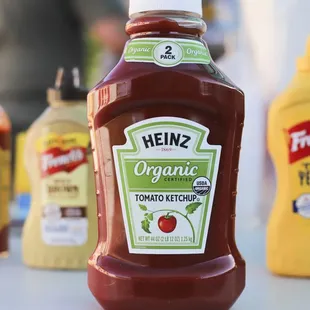 ketchup bottles on a table