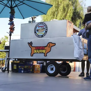 a woman holding a dog