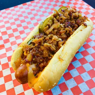 Nacho bacon love signature dog. Bacon, nacho cheese, gourmet local pickles