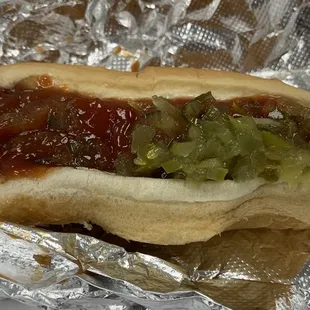 All beef hot dog with ketchup and relish