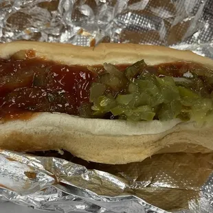 All beef hot dog with ketchup and relish