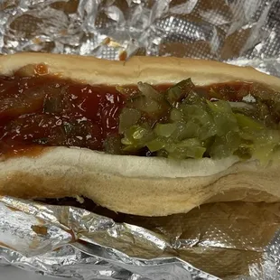 All beef hot dog with ketchup and relish
