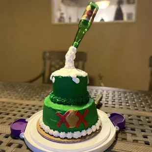 a cake with a baseball bat on top