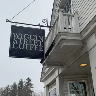 a sign for wiggin street coffee