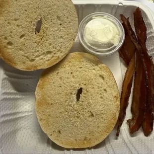Bagel with cream cheese with side bacon
