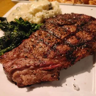a steak and mashed potatoes