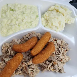 BBQ plate with hushpuppies, potato salad and slaw