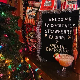 a christmas tree and a welcome sign