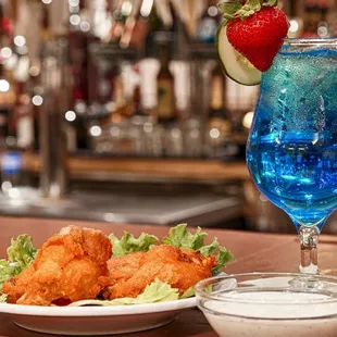 a plate of food and a drink