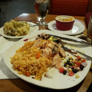 The extra rice above the plate is what I asked for because the rice under the fish was cold.