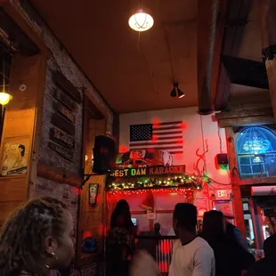 a crowd of people at a bar