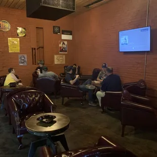 a group of people sitting in chairs