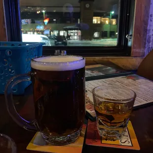 two beer glasses on a table