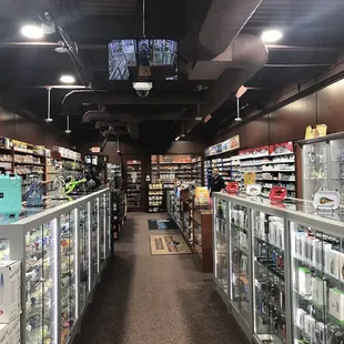 One of the aisles in the store - huge humidor in the back with fresh cigars!