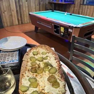a pizza and a pool table